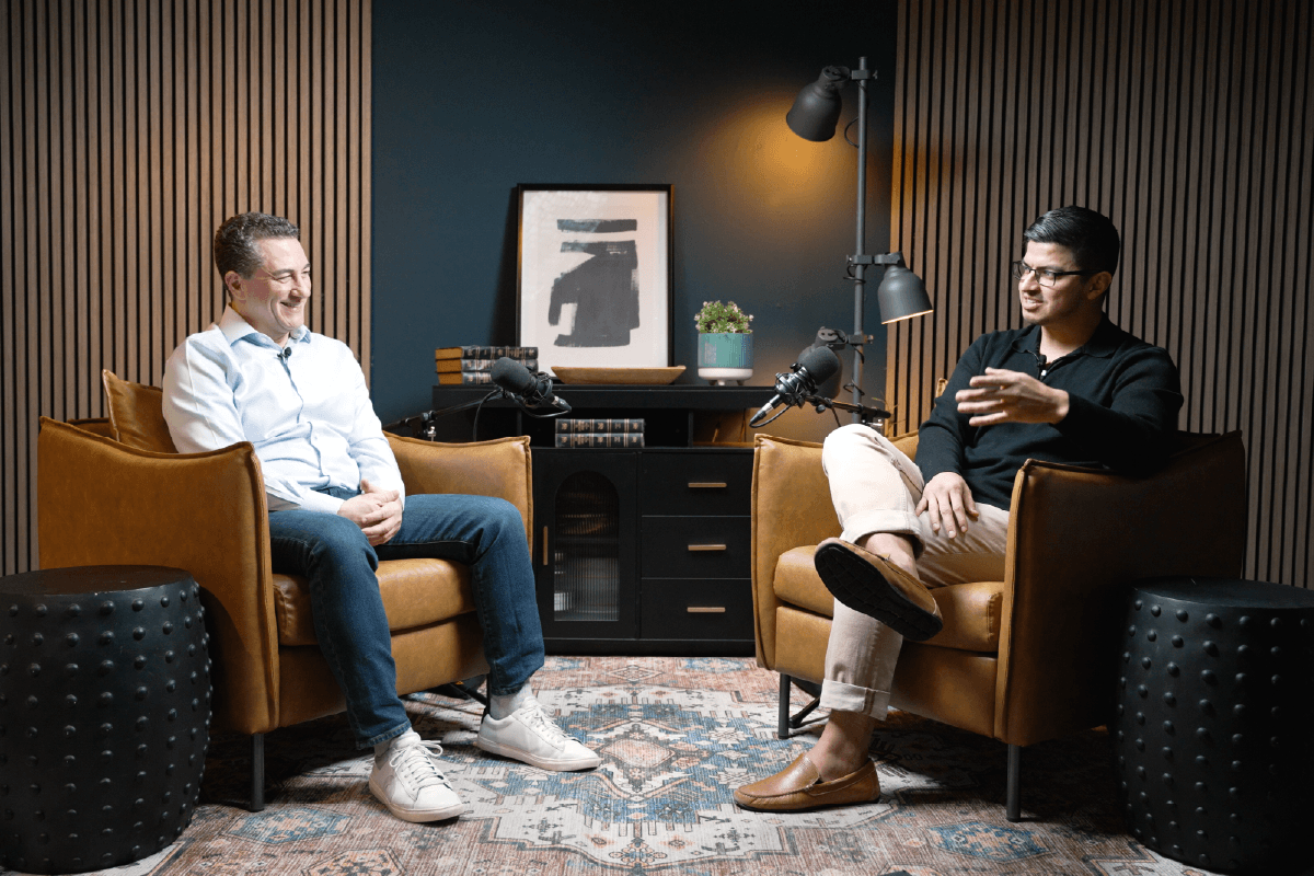 Michael Schoen and interviewer in a podcast-style studio conversation, discussing 2026 marketing and advertising trends., Go to The 2026 Trends Preview: What Marketers Need to Know